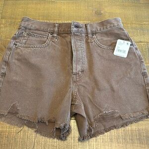 Size 27 brown shorts. NEVER WORN!! brand new with tags